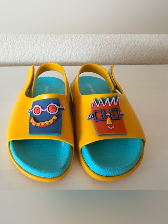 Mini Melissa Other - Mini Melissa Unisex Yellow Sandals with Blue Insole and robot characters.